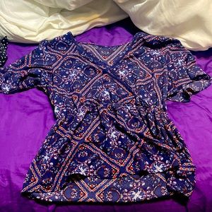 Dark blue with red and white accents